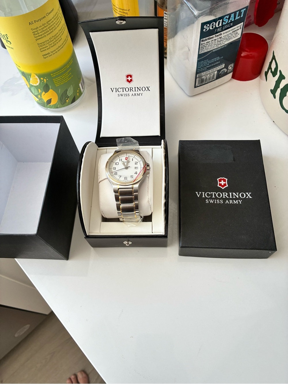 Victorinox Swiss Army Silver Watch with White Dial and Red Accent